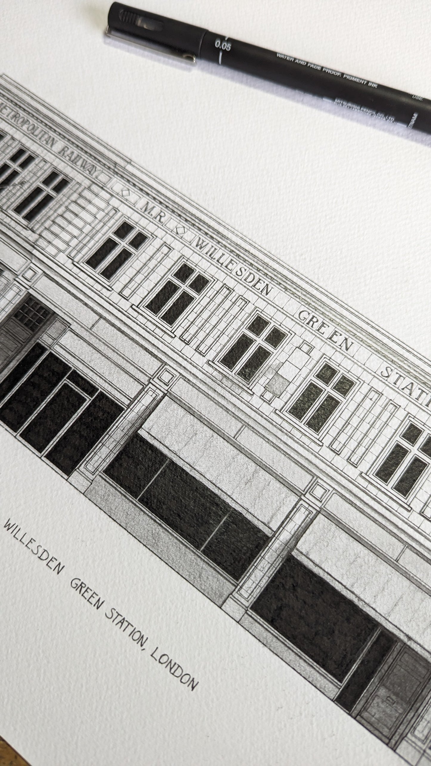 Hand sketched architectural illustration of Willesden Green Tube Station, London