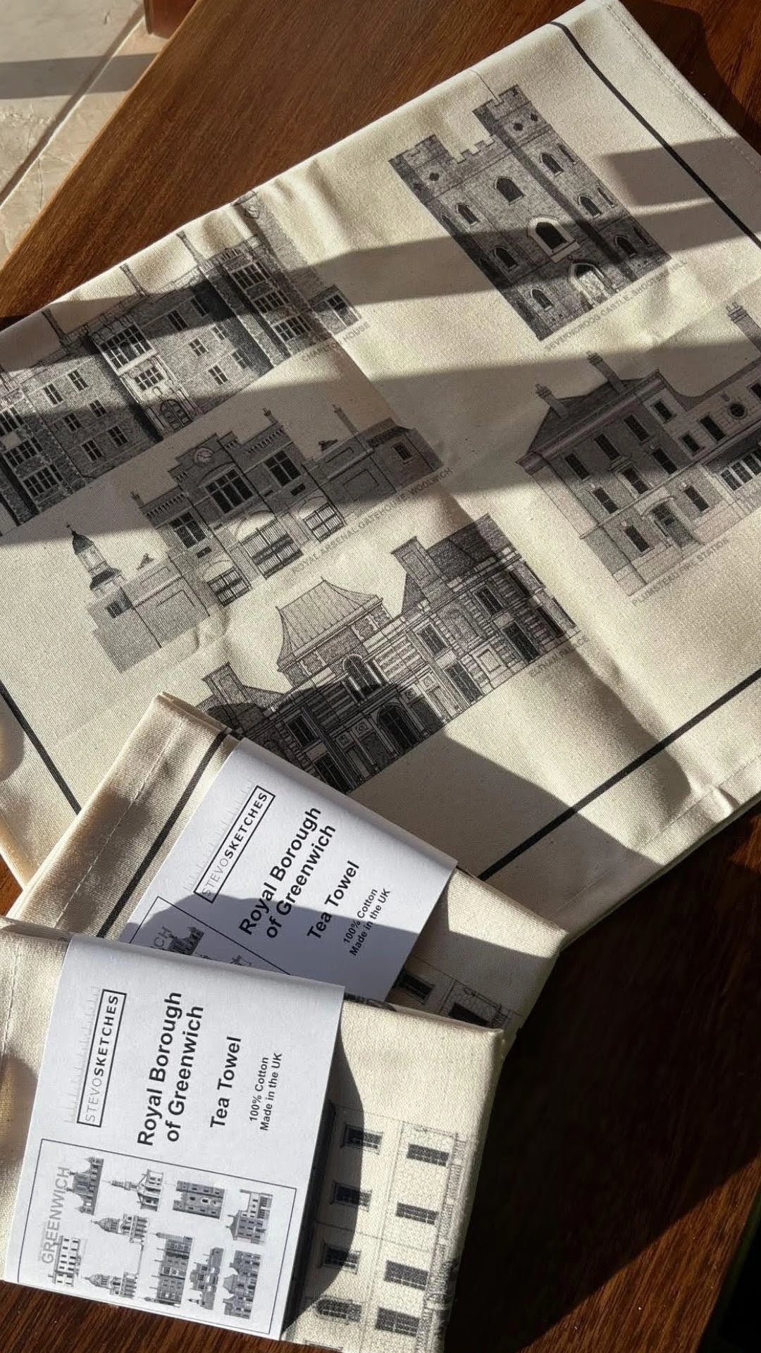 Fabric cotton tea towel with architectural drawings of Greenwich buildings