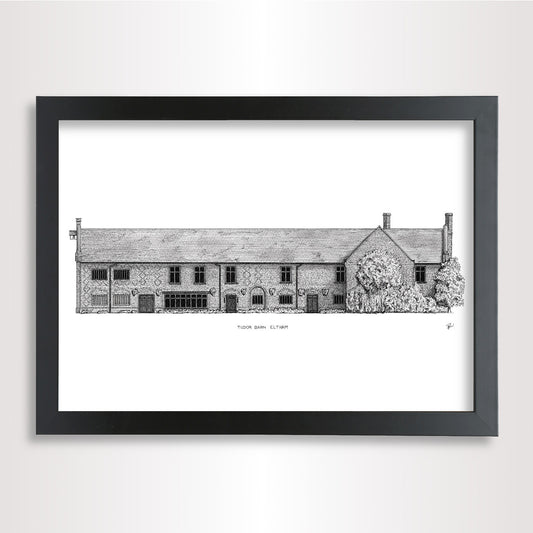 A framed black and white architectural print of 'Tudor Barn Eltham' on a white paper, enclosed in a black frame and shown against a light gray wall.